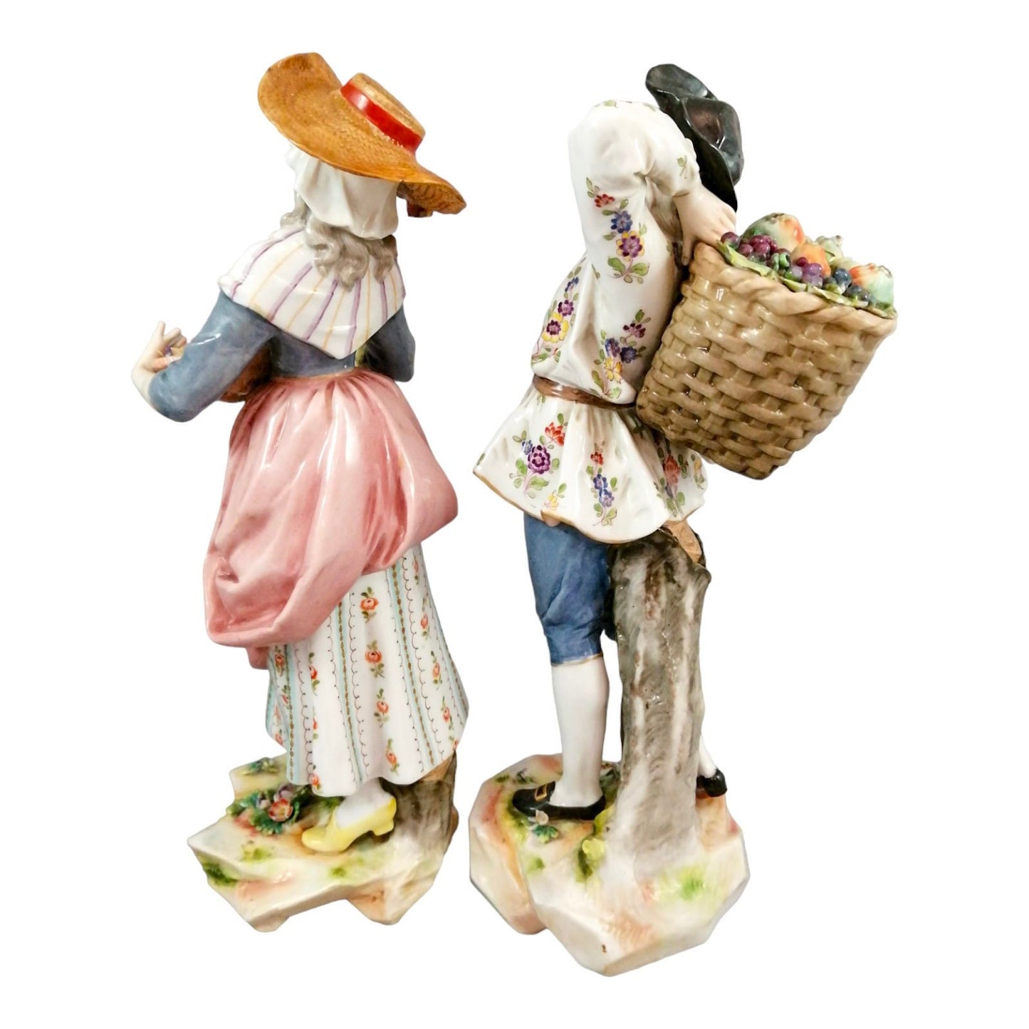 Pair of large Ludwigsburg porcelain figurines of peasant girl and boy with autumn harvest