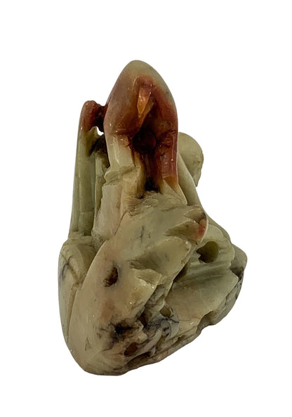 Chinese Republic red yellow soapstone figurine of small monkey on rocks