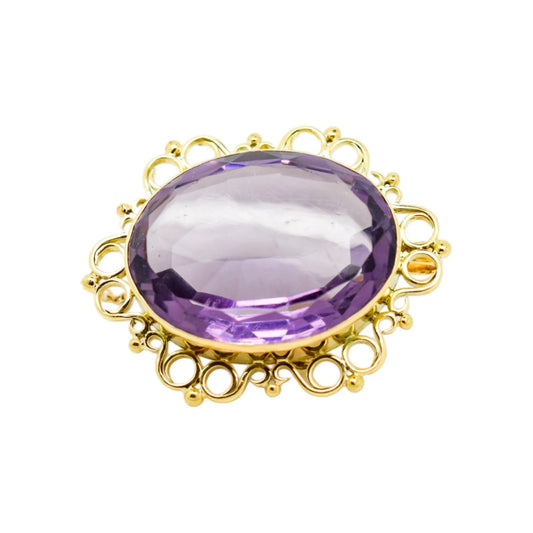 1980's huge 45 ct amethyst oval combination brooch and pendant in openwork 9ct gold setting