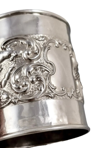 Edwardian sterling silver Christening cup embossed cherubs, rabbits and scrolling foliage, Crisford & Norris