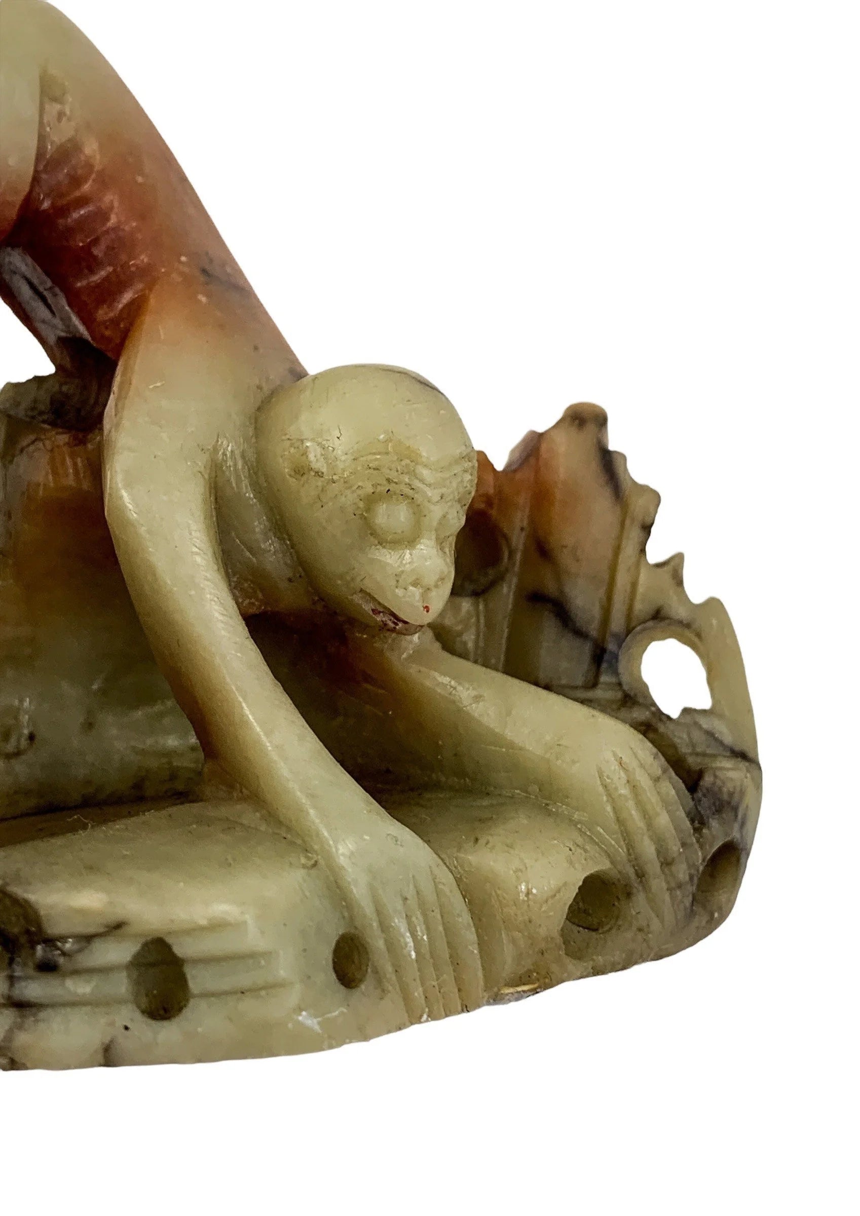 Chinese Republic red yellow soapstone figurine of small monkey on rocks