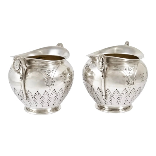 American 19th century P.L. Krider pair of large gilt silver table salts with ram horn handles and palmettes