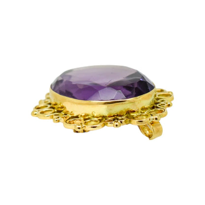 1980's huge 45 ct amethyst oval combination brooch and pendant in openwork 9ct gold setting