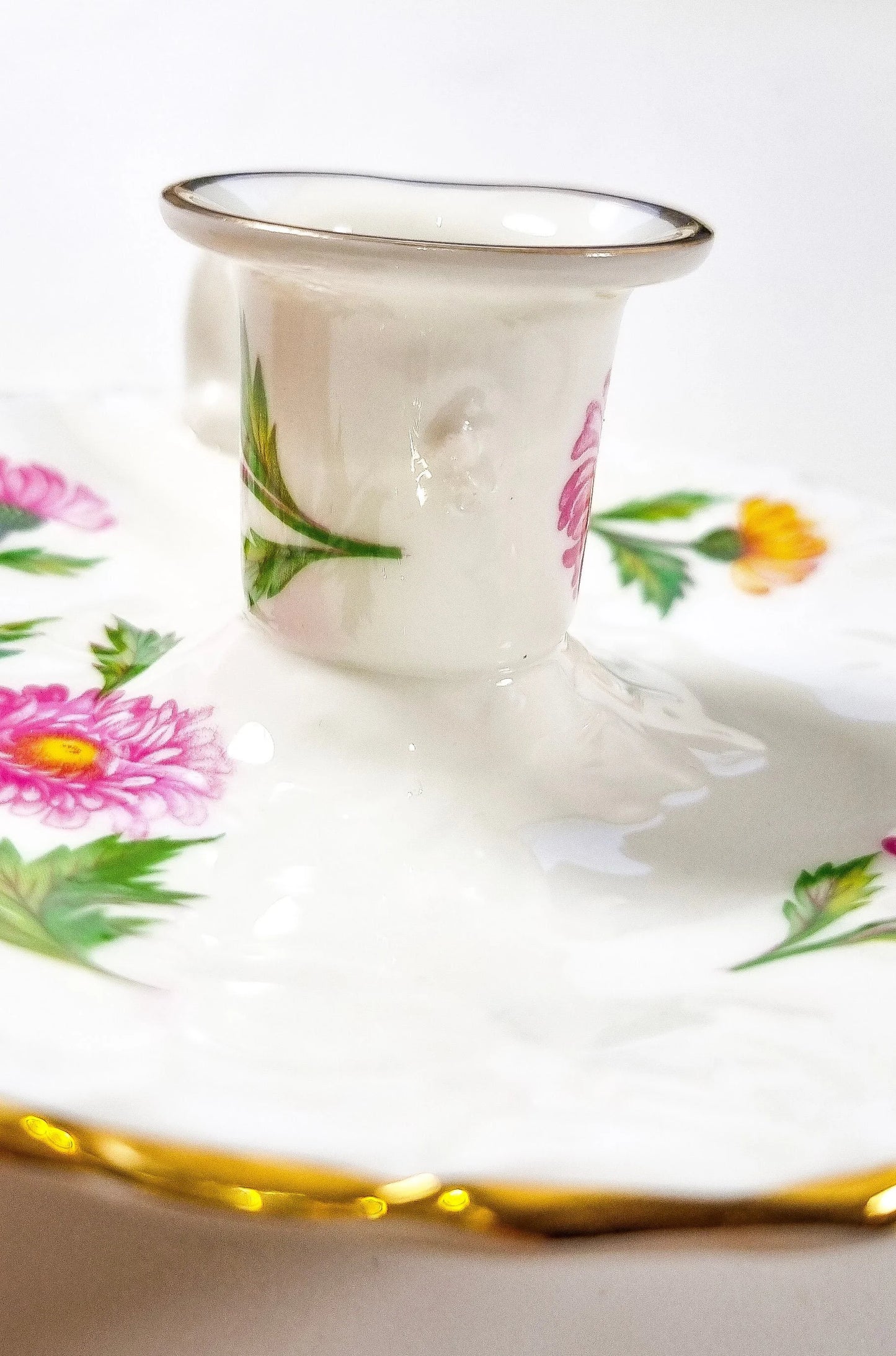 Hammersley and Co pair of bone china chambersticks moulded with scrolls and gilded
