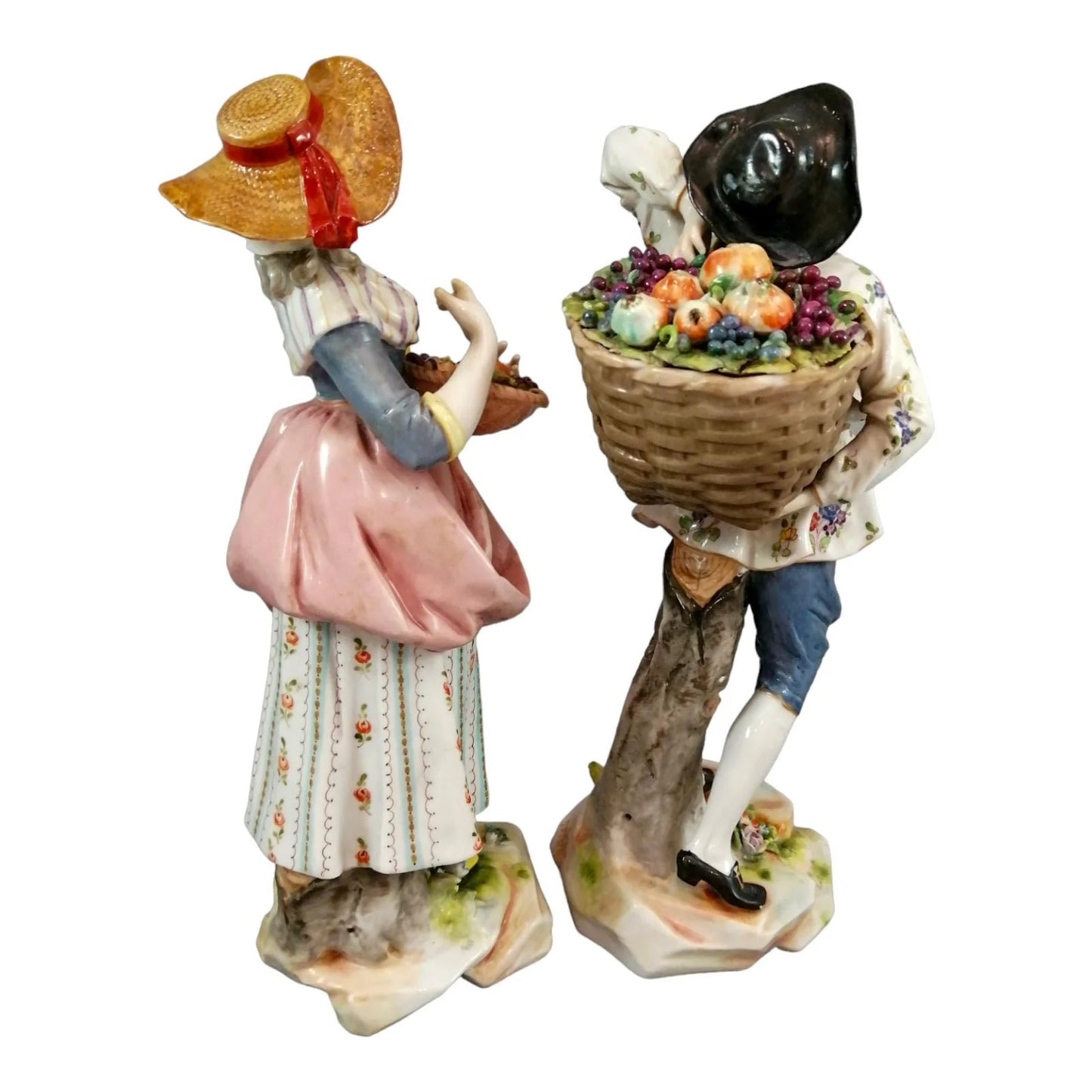 Pair of large Ludwigsburg porcelain figurines of peasant girl and boy with autumn harvest