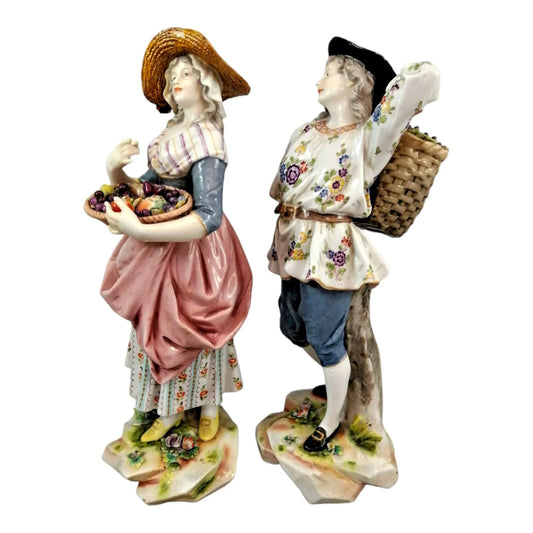 Pair of large Ludwigsburg porcelain figurines of peasant girl and boy with autumn harvest