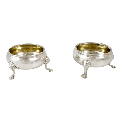 George II gilt sterling silver pair of two tripod cauldron salts, unicorn family crest, 1743
