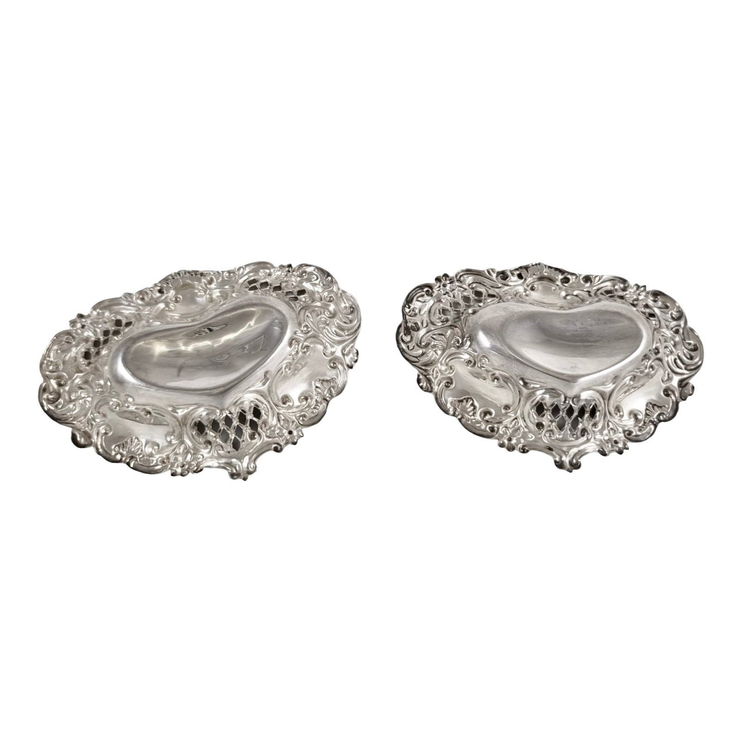 Victorian sterling silver pair of pin trays / trinket dishes heart-shaped embossed with scrolls and flowers, Henry Matthews, 1900