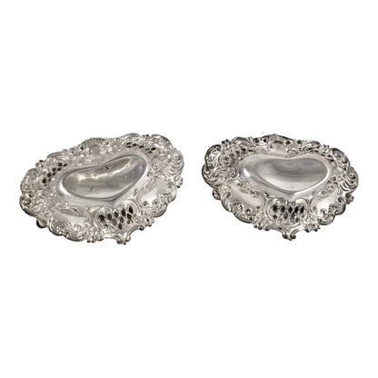 Victorian sterling silver pair of pin trays / trinket dishes heart-shaped embossed with scrolls and flowers, Henry Matthews, 1900