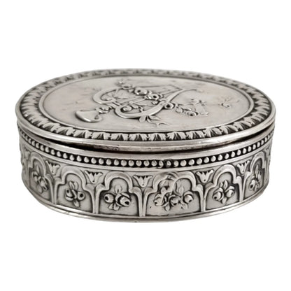 Antique Continental gilt solid silver oval snuff / pill box embossed with lyre and flower garlands