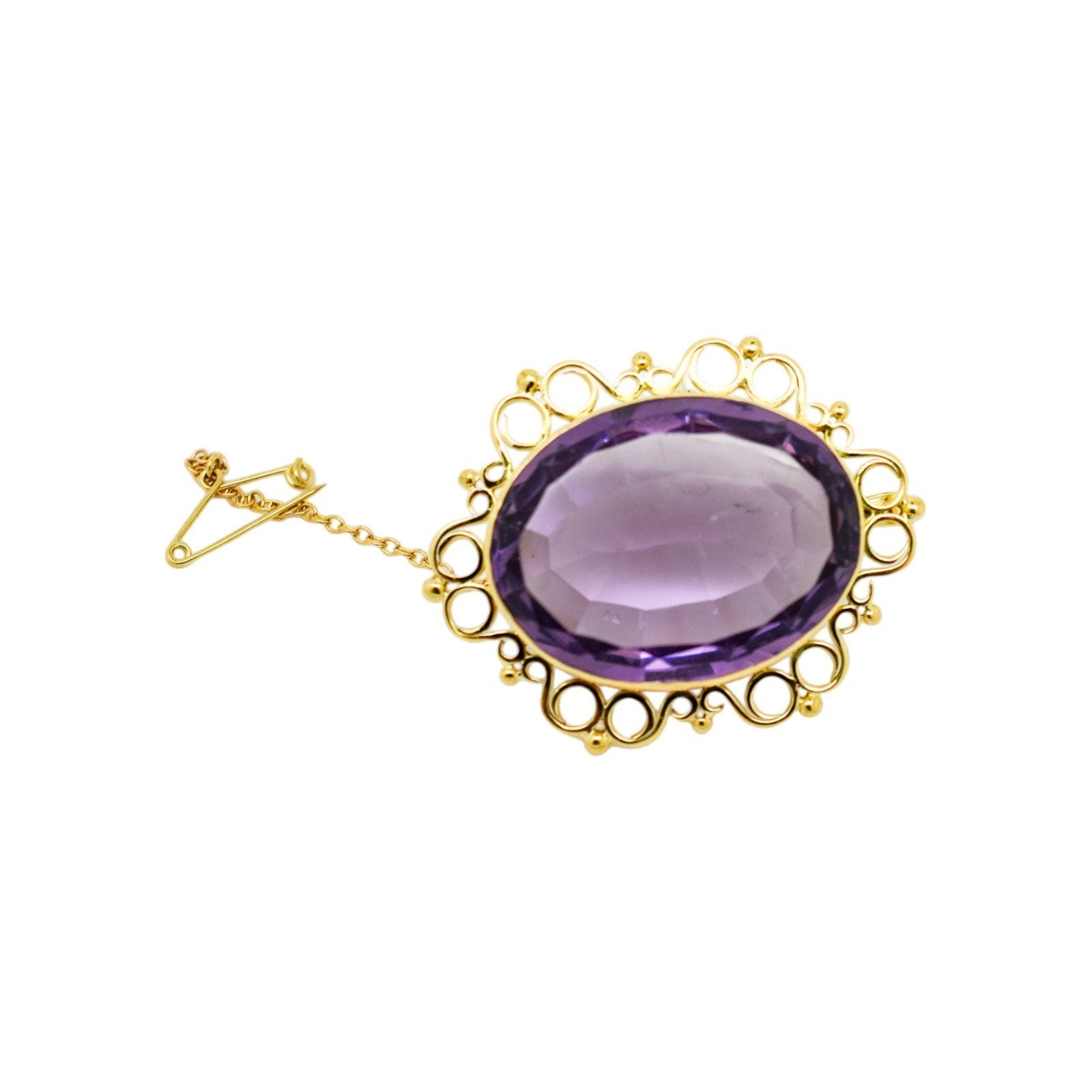 1980's huge 45 ct amethyst oval combination brooch and pendant in openwork 9ct gold setting