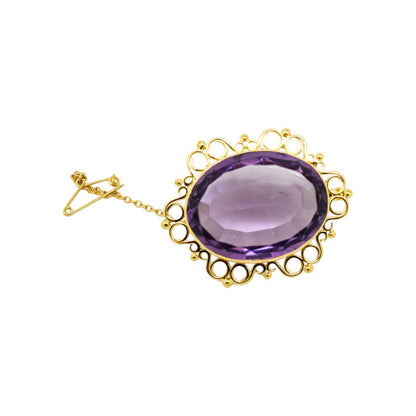 1980's huge 45 ct amethyst oval combination brooch and pendant in openwork 9ct gold setting