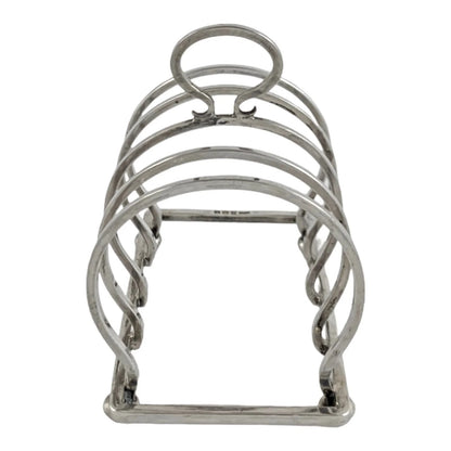 George V round sterling silver 4 slot 5 bar toast rack raised on bun feet, Walker & Hall