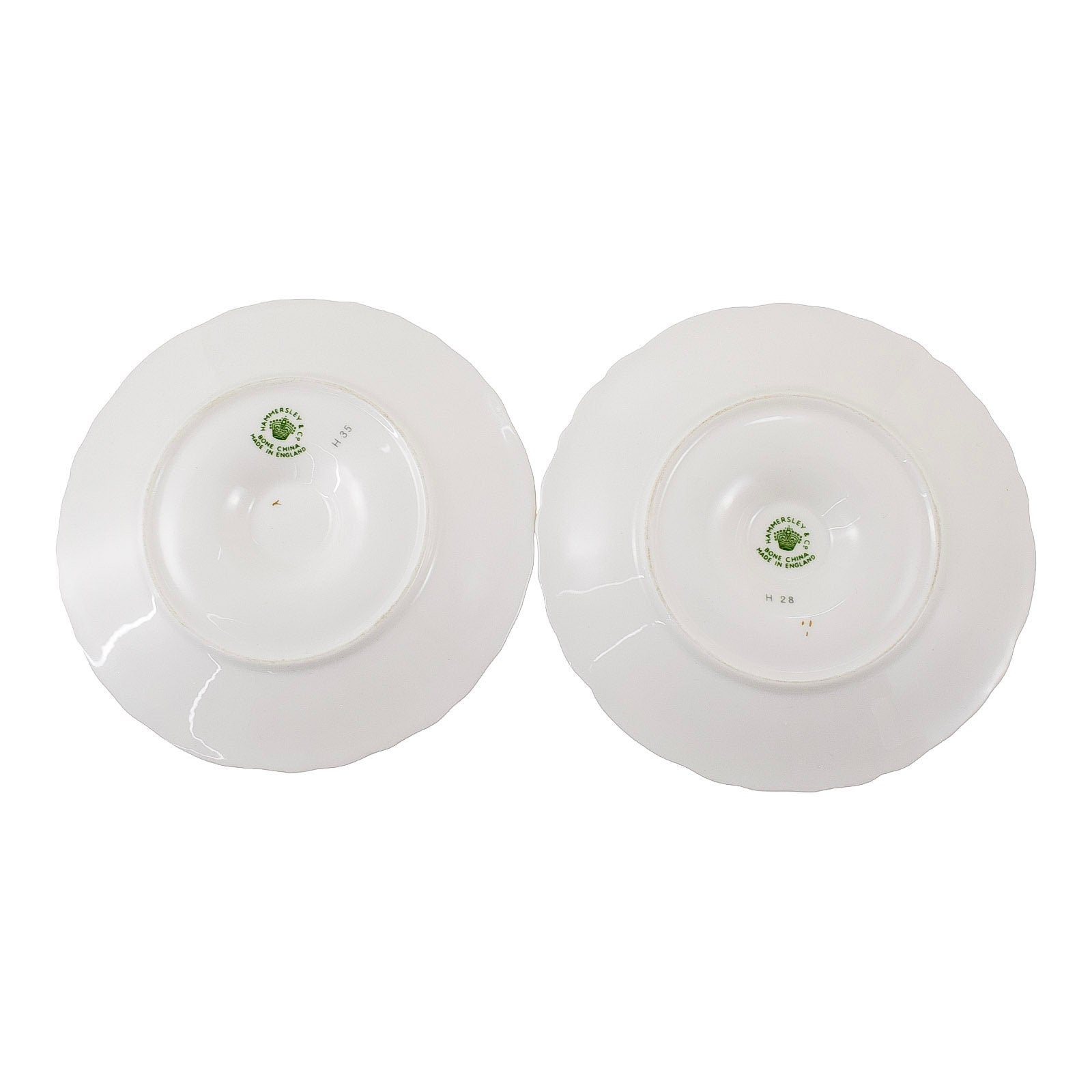 Hammersley and Co pair of bone china chambersticks moulded with scrolls and gilded