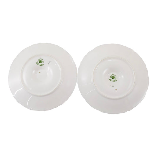 Hammersley and Co pair of bone china chambersticks moulded with scrolls and gilded