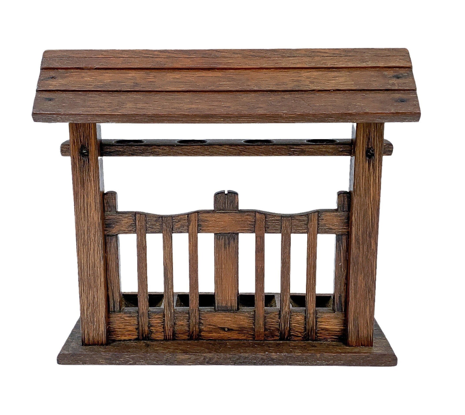 Vintage novelty oak 4-pipe rack stand in the form of a fence with roof on top