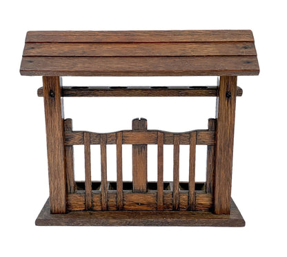 Vintage novelty oak 4-pipe rack stand in the form of a fence with roof on top