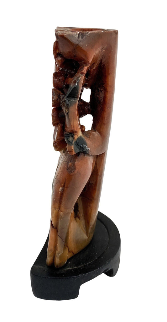 Qing dynasty red soapstone figural candlestick with deer, bird and prunus tree