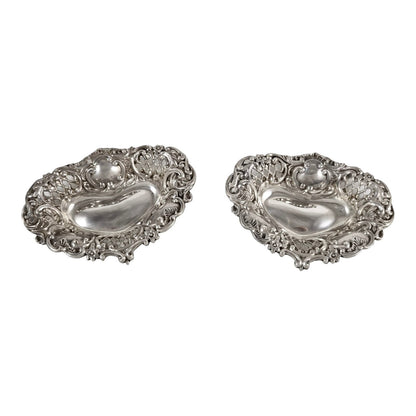 Victorian sterling silver pair of pin trays / trinket dishes heart-shaped embossed with scrolls and flowers, Henry Matthews, 1900