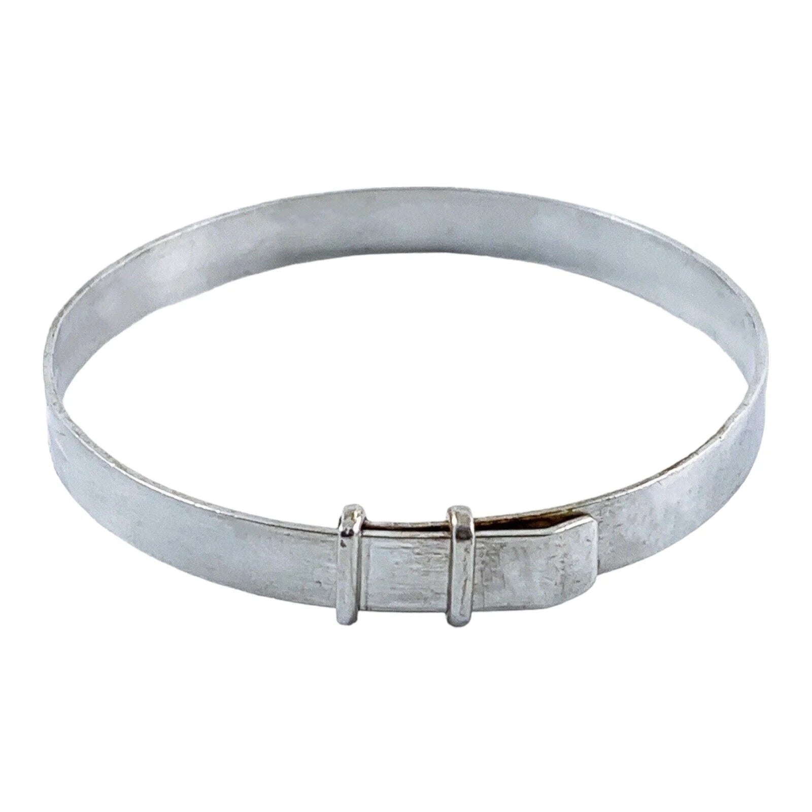 1970’s sterling silver child's adjustable "belt" bracelet with buckle detail and bright-cut leaf design