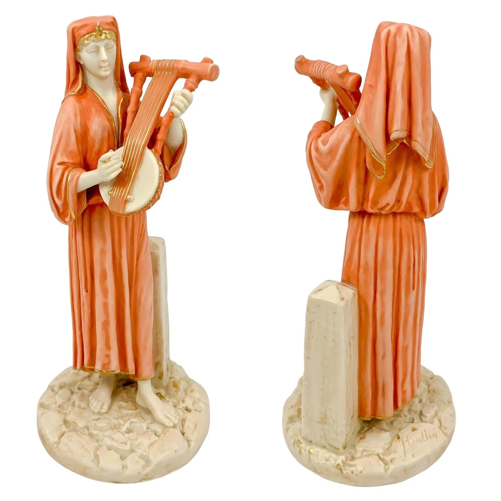 Pair of Victorian Royal Worcester (James Hadley) figurines of Egyptian musicians, model 1084