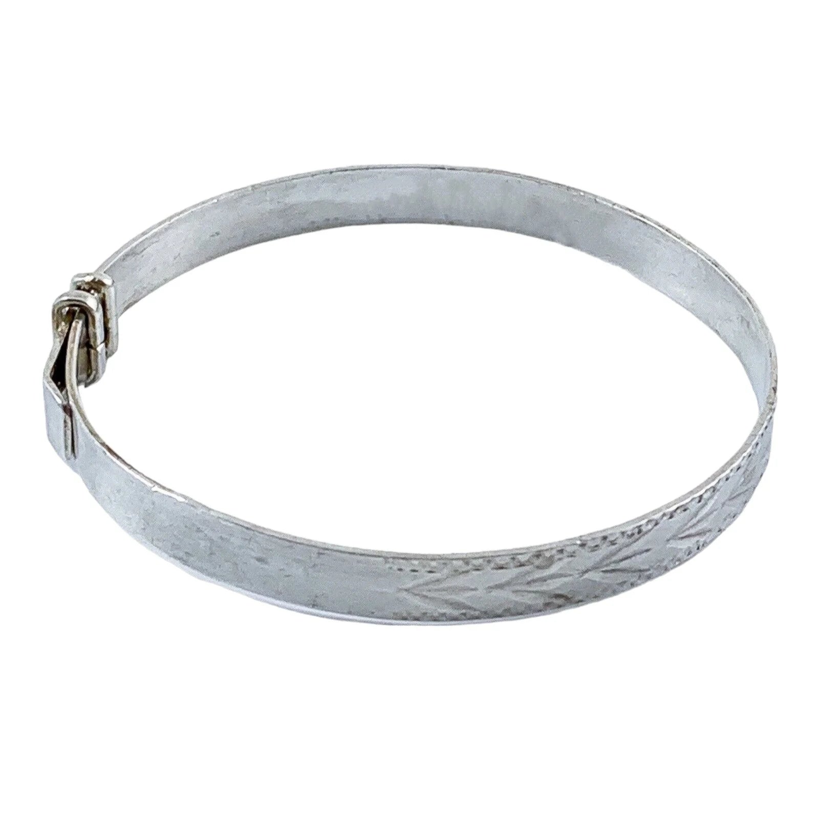 1970’s sterling silver child's adjustable "belt" bracelet with buckle detail and bright-cut leaf design