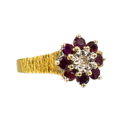 1970’s 9ct yellow gold ruby diamond floral cluster halo ring with textured shank, size M 1/2