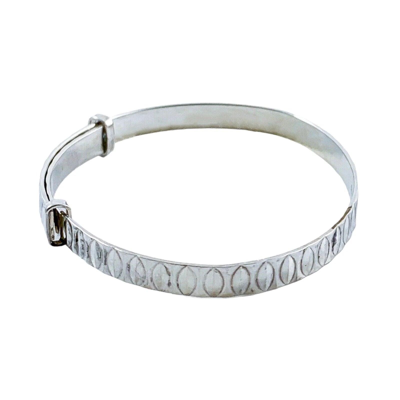 1970’s sterling silver child's adjustable “belt” bracelet with buckle detail and faceted decoration
