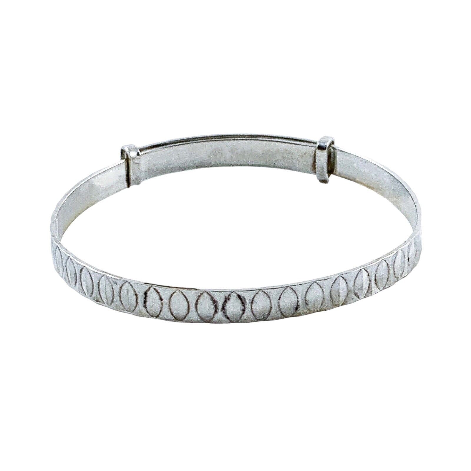 1970’s sterling silver child's adjustable “belt” bracelet with buckle detail and faceted decoration