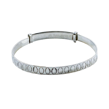 1970’s sterling silver child's adjustable “belt” bracelet with buckle detail and faceted decoration