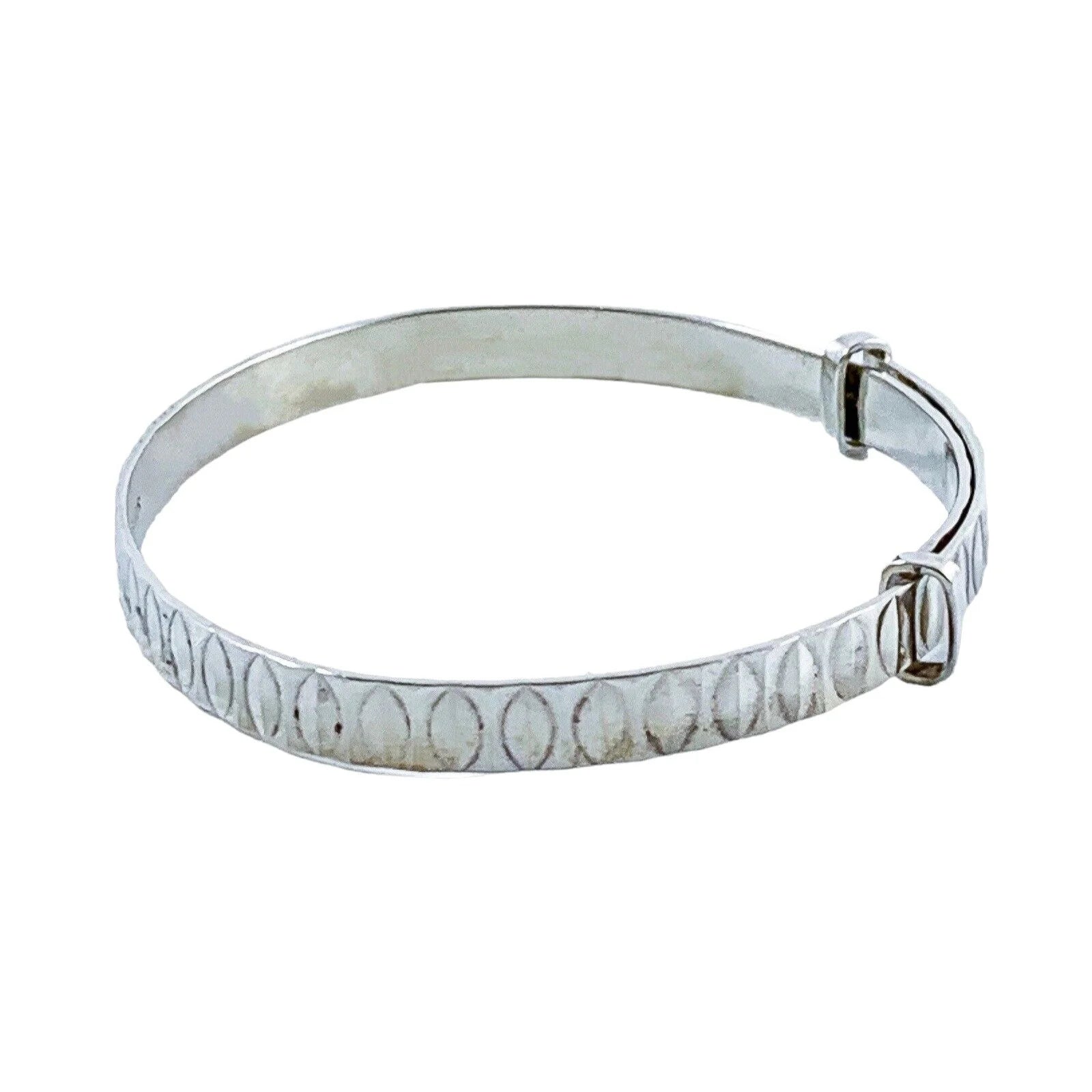 1970’s sterling silver child's adjustable “belt” bracelet with buckle detail and faceted decoration