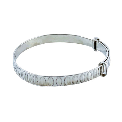 1970’s sterling silver child's adjustable “belt” bracelet with buckle detail and faceted decoration
