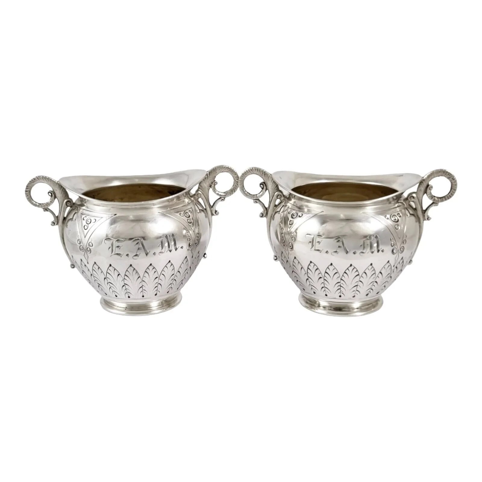 American 19th century P.L. Krider pair of large gilt silver table salts with ram horn handles and palmettes