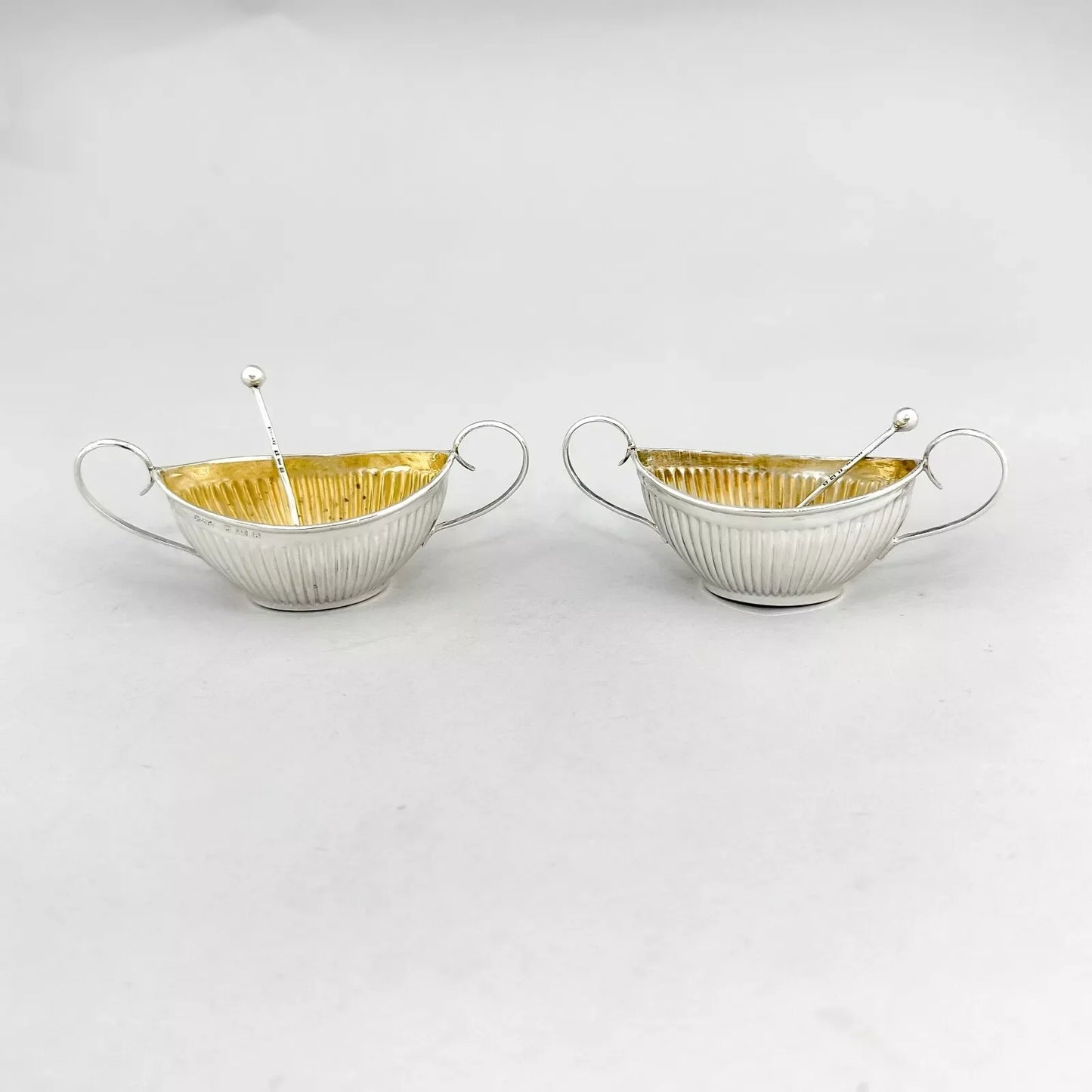 Neoclassical gilt sterling silver boxed navette salts with shell spoons