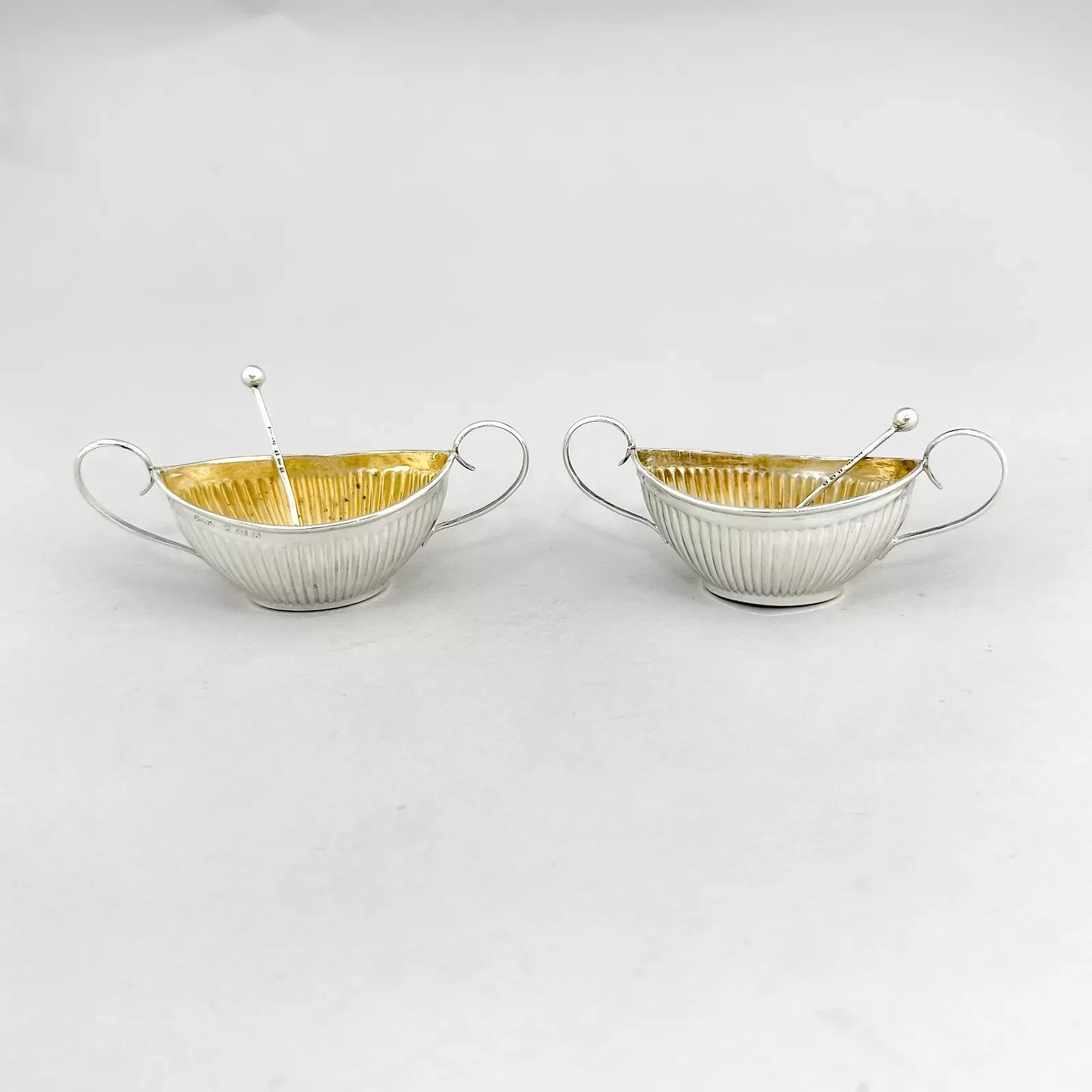 Neoclassical gilt sterling silver boxed navette salts with shell spoons