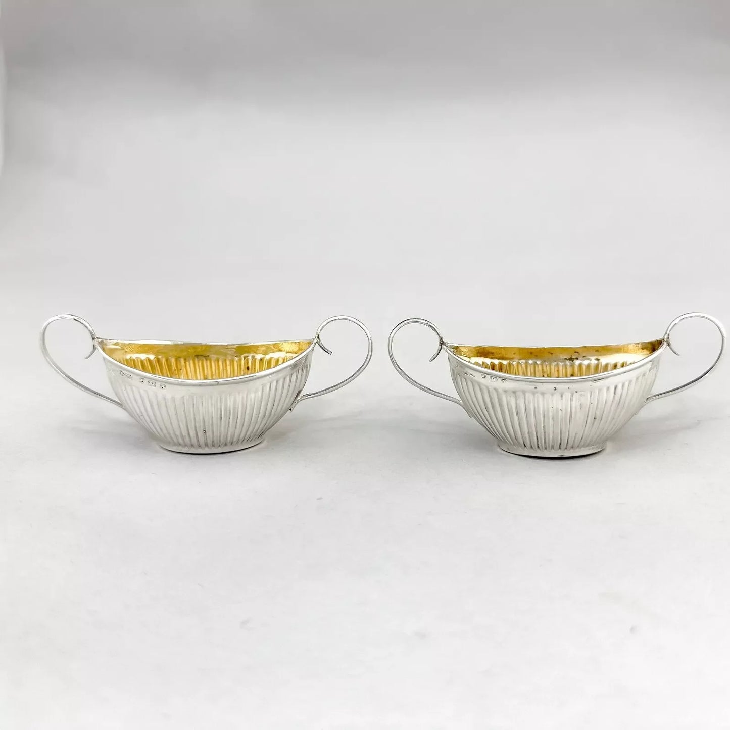 Neoclassical gilt sterling silver boxed navette salts with shell spoons