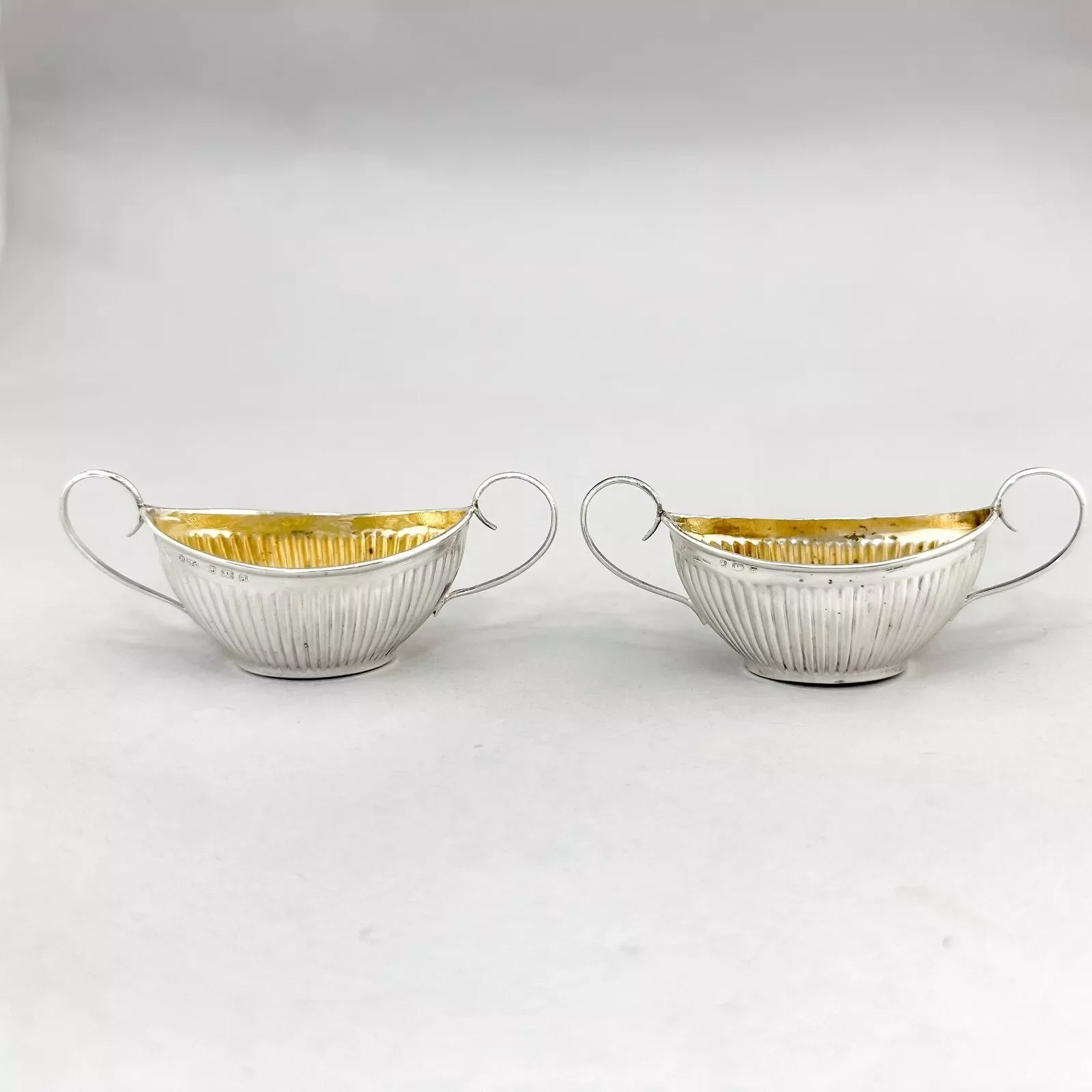 Neoclassical gilt sterling silver boxed navette salts with shell spoons