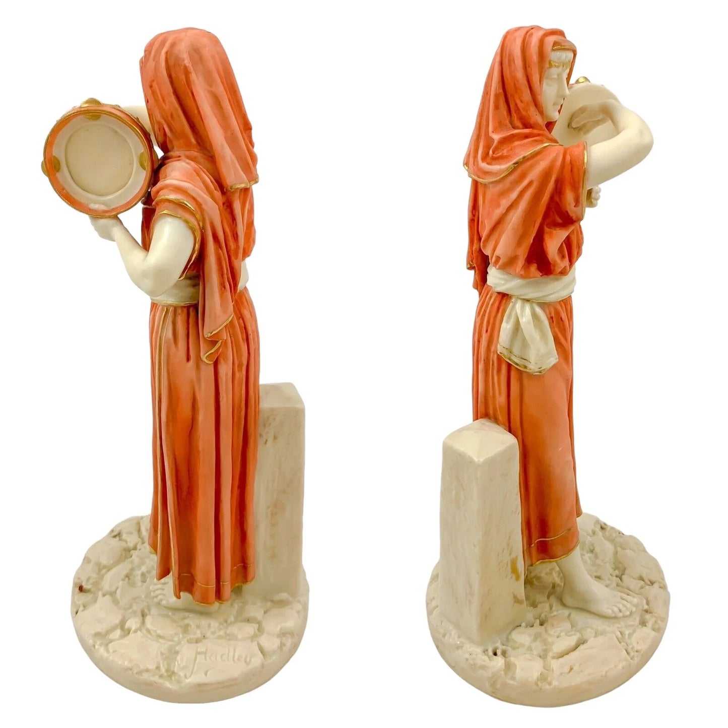 Pair of Victorian Royal Worcester (James Hadley) figurines of Egyptian musicians, model 1084
