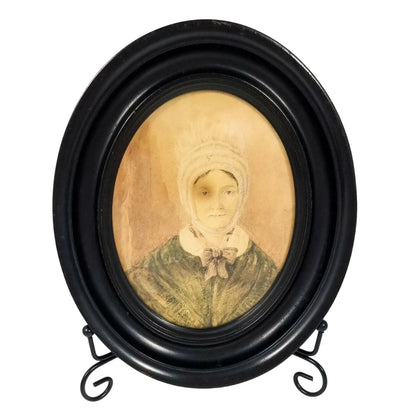 Victorian watercolour miniature portrait of matron in mob cap, oval ebonised frame