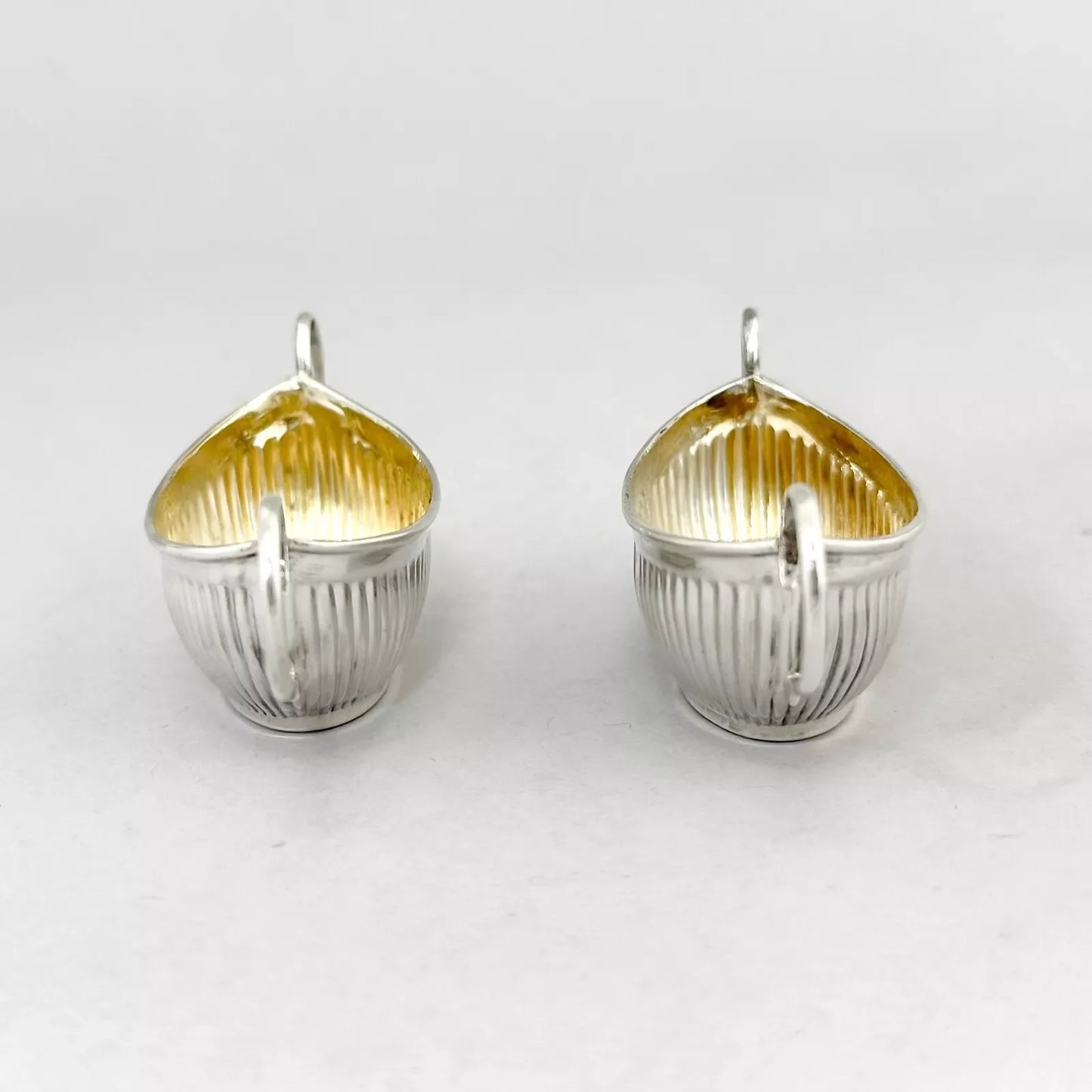 Neoclassical gilt sterling silver boxed navette salts with shell spoons