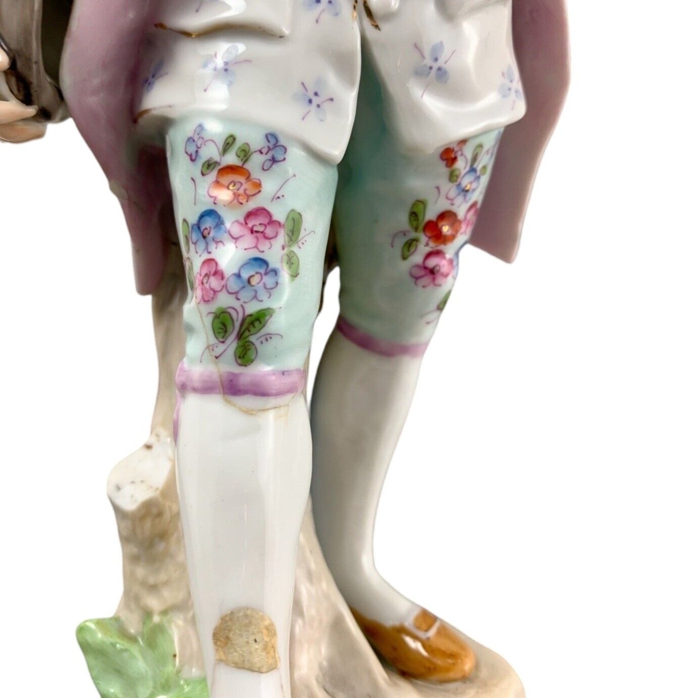 1830’s Meissen porcelain figurine of Regency dandy gentleman holding a tricorne and flowers