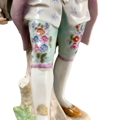 1830’s Meissen porcelain figurine of Regency dandy gentleman holding a tricorne and flowers
