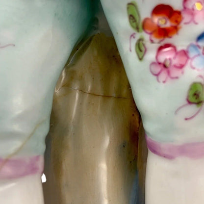 1830’s Meissen porcelain figurine of Regency dandy gentleman holding a tricorne and flowers