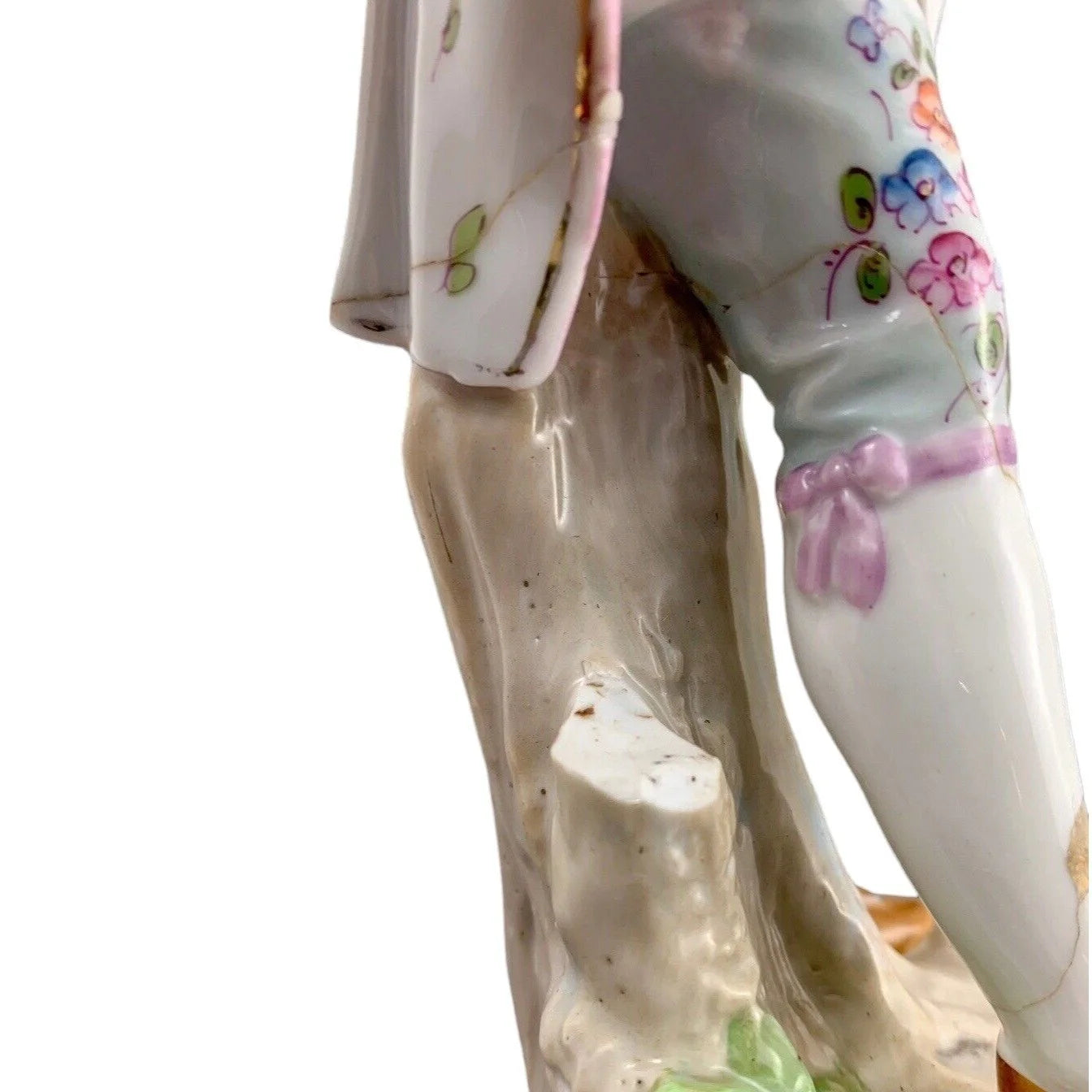 1830’s Meissen porcelain figurine of Regency dandy gentleman holding a tricorne and flowers