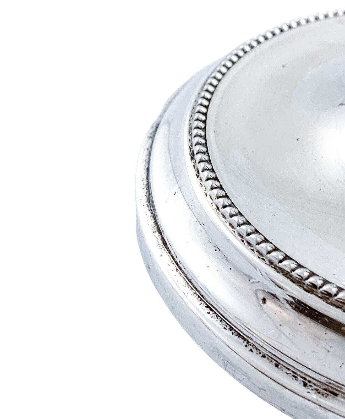 Tall crystal trumpet vase resting on a sterling silver stepped round foot