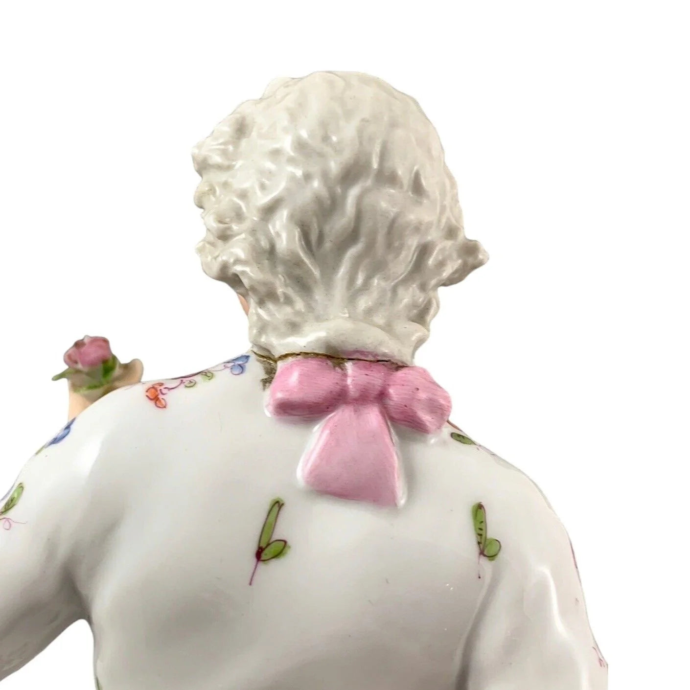 1830’s Meissen porcelain figurine of Regency dandy gentleman holding a tricorne and flowers